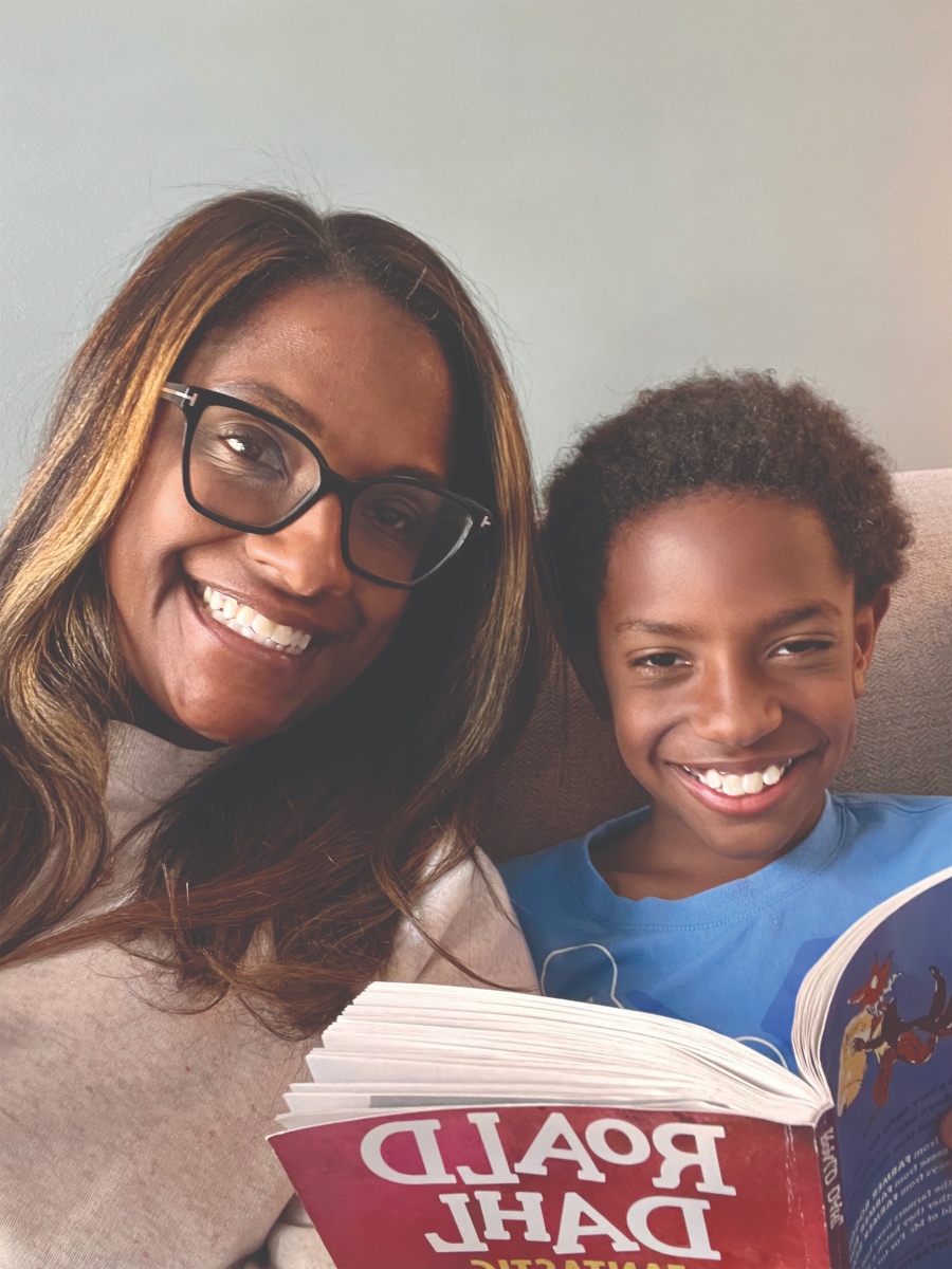 Child reading with parent