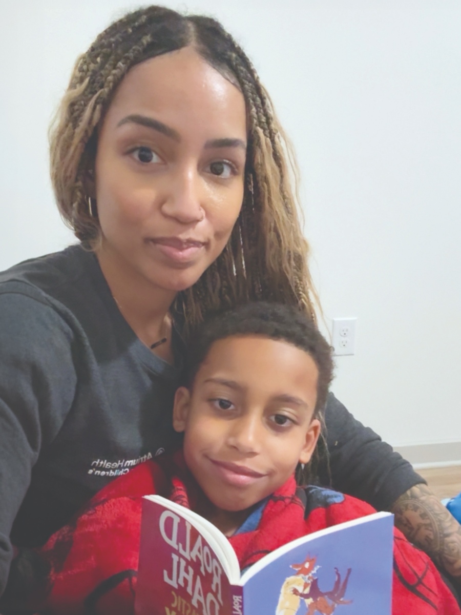 Child reading with parent